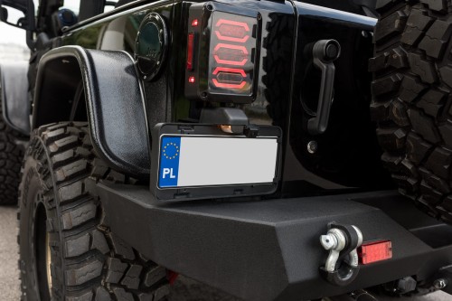 JEEP WRANGLER JK 2007-2018 WERSJA USA MOCOWANIE TYLNEJ TABLICY REJESTRACYJNEJ OEM 68064720AA