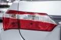 TOYOTA COROLLA XI E16 2013-2016 SEDAN PRZED LIFTINGIEM LAMPA KLAPY TYLNEJ LEWA 8159102530