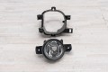 NISSAN NAVARA NP300 2014-2019 PRZED FACELIFTINGIEM LAMPA PRZECIWMGIELNA Z MOCOWANIEM LEWA 261558994A