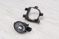 NISSAN NAVARA NP300 2014-2019 PRZED FACELIFTINGIEM LAMPA PRZECIWMGIELNA Z MOCOWANIEM LEWA 261558994A