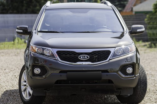 KIA SORENTO II XM 2009-2012 PRZED FACELIFTINGIEM NAKŁADKI NA LAMPY PRZEDNIE