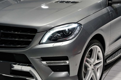 MERCEDES ML W166 2011-2015 ZAŚLEPKA SPRYSKIWACZA REFLEKTORA LEWA A1668600108