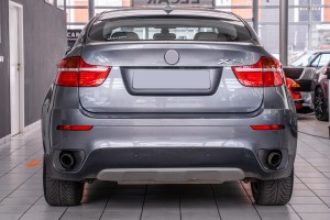 BMW X6 E72 2007-2014 LAMPA PRZECIWMGIELNA TYLNA LEWA Z ODBLASKIEM 63147187219