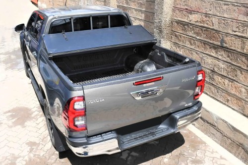 NISSAN NAVARA NP300 2014+ TWARDA SKŁADANA POKRYWA PAKI Z LED