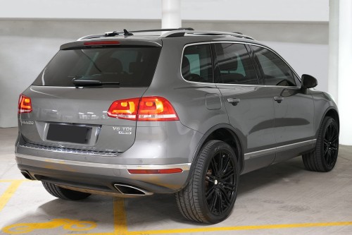 VOLKSWAGEN TOUAREG II 7P 2014-2018 PO FACELIFTINGU ODBLASK TYLNEGO ZDERZAKA PRAWY 7P6945106A