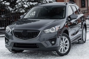 MAZDA CX-5 I KE 2012-2017 PRZEDNIA LAMPA PRZECIWMGIELNA ZE WSPORNIKIEM LEWA KD5351694A