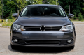 VOLKSWAGEN JETTA VI A6 2010-2014 PRZED FACELIFTINGIEM LAMPA PRZECIWMGIELNA PRZEDNIA LEWA 5K0941699G