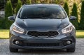 KIA CEED II JD 2012-2015 PRZED FACELIFTINGIEM RAMKA LAMPY PRZECIWMGIELNEJ PRZEDNIA LEWA 86563A2000