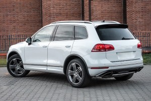 VOLKSWAGEN TOUAREG II 7P 2014-2018 PO FACELIFTINGU LAMPA PRZECIWMGIELNA ODBLASK TYLNY LEWY 7P6945701K 