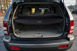 JEEP GRAND CHEROKEE III WK 2005-2010 ROLETA BAGAŻNIKA CZARNA 5HS38BD5AA 82209393AB