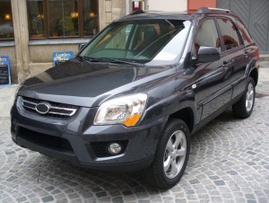 KIA SPORTAGE II JE 2008-2010 PO FACELIFTINGU NAKŁADKI NA LAMPY PRZEDNIE